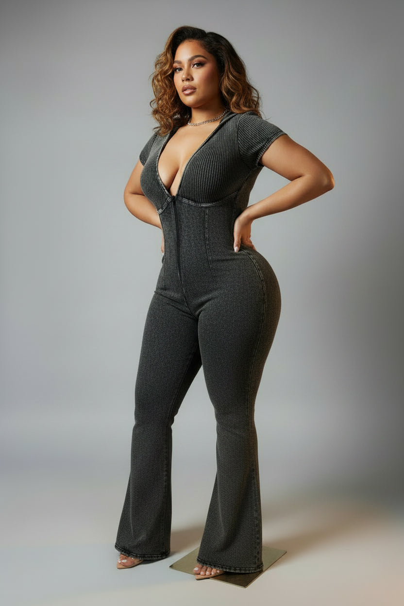 Mannequin wearing a gray denim dress on a plain background